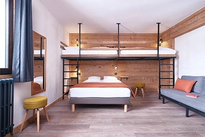 Une chambre d'hôtel familiale et cosy au Christiania